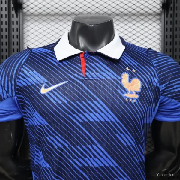 Version 2026 France Home Blue with Diagonal Brushstroke Stripe Polo Collar Jersey
