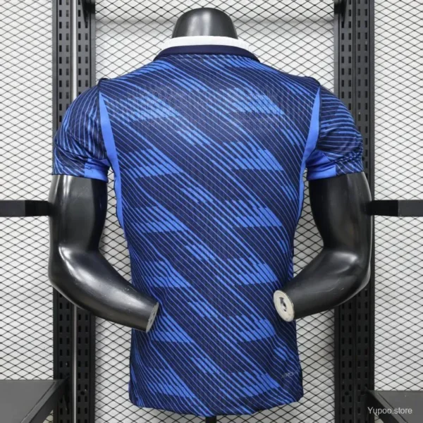Version 2026 France Home Blue with Diagonal Brushstroke Stripe Polo Collar Jersey